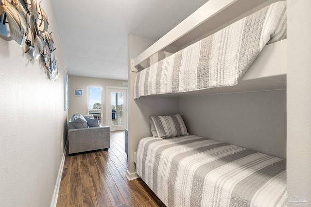 bedroom featuring dark wood-type flooring