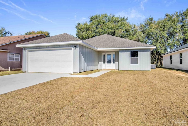 ranch-style house with a front yard and a garage