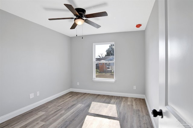 unfurnished room featuring ceiling fan and light hardwood / wood-style flooring