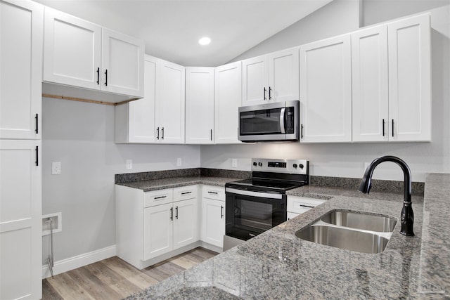 kitchen featuring white cabinetry, sink, and stainless steel appliances