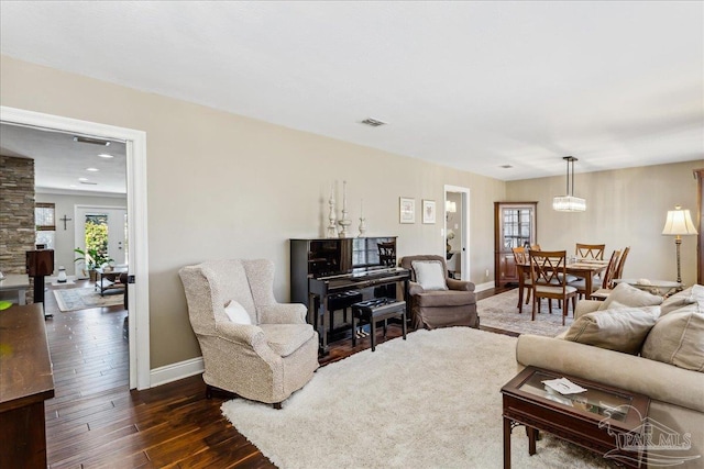 living room with dark wood-type flooring