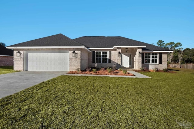 prairie-style house with a front lawn and a garage