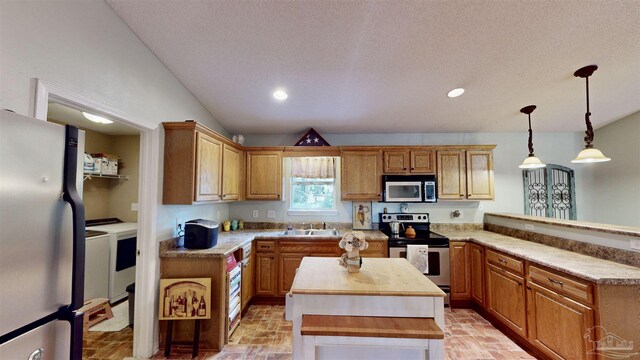 kitchen featuring sink, vaulted ceiling, ceiling fan, appliances with stainless steel finishes, and butcher block countertops