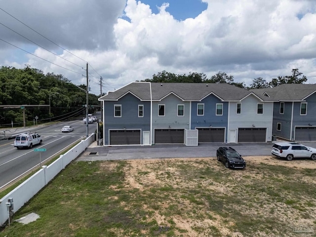 800 N Baylen St, Pensacola, FL 32501 - townhome / multi-family property with an attached garage and driveway