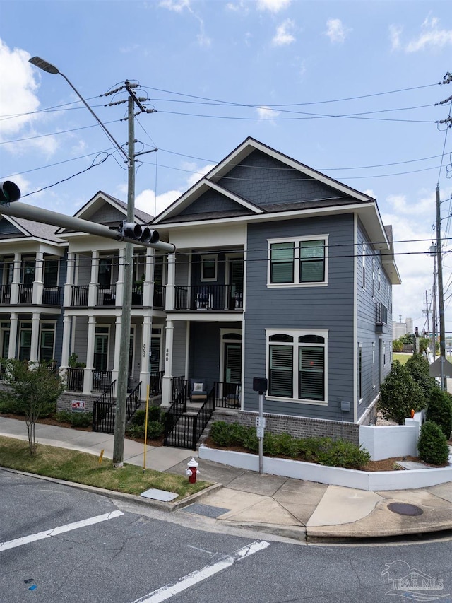 800 N Baylen St, Pensacola, FL 32501 - townhome / multi-family property featuring a balcony and a porch