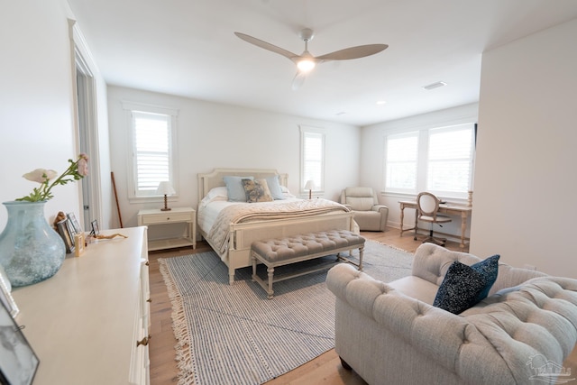 800 N Baylen St, Pensacola, FL 32501 - bedroom featuring multiple windows, wood finished floors, and ceiling fan