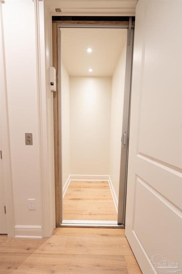 800 N Baylen St, Pensacola, FL 32501 - detailed view of wood finished floors, baseboards, and recessed lighting
