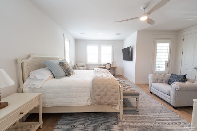 800 N Baylen St, Pensacola, FL 32501 - bedroom featuring light wood-style flooring, a ceiling fan, and baseboards