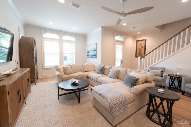 800 N Baylen St, Pensacola, FL 32501 - living area featuring crown molding, light wood-type flooring, a ceiling fan, stairs, and recessed lighting