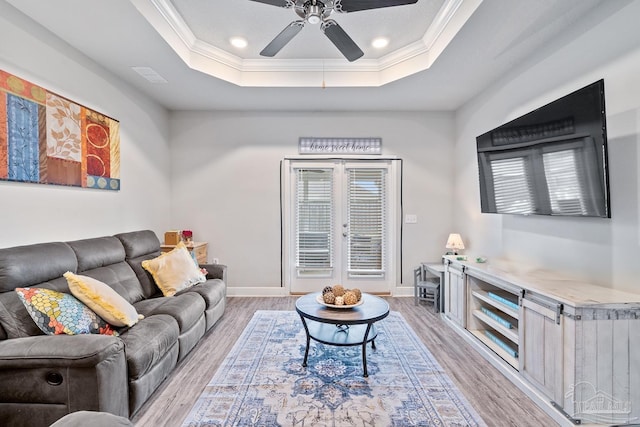 5323 Red Shoulder Rd, Pace, FL 32571 - living room with ornamental molding, a tray ceiling, a ceiling fan, light wood-style floors, and recessed lighting