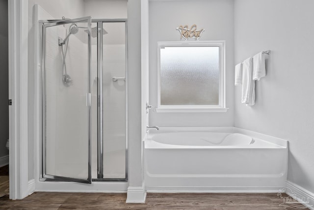 5323 Red Shoulder Rd, Pace, FL 32571 - full bath with a stall shower, a bath, and wood finished floors