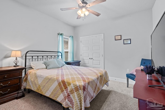 5323 Red Shoulder Rd, Pace, FL 32571 - carpeted bedroom with baseboards and a ceiling fan