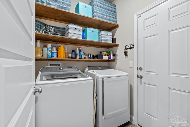 5323 Red Shoulder Rd, Pace, FL 32571 - laundry area with washer and clothes dryer