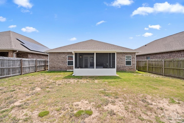 5323 Red Shoulder Rd, Pace, FL 32571 - back of property featuring a sunroom and brick siding