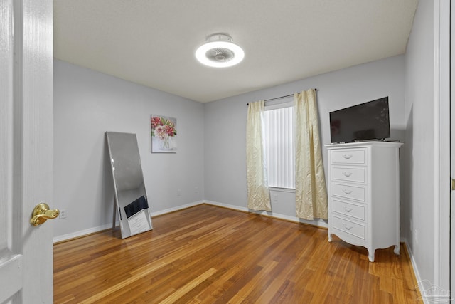 miscellaneous room with wood-type flooring