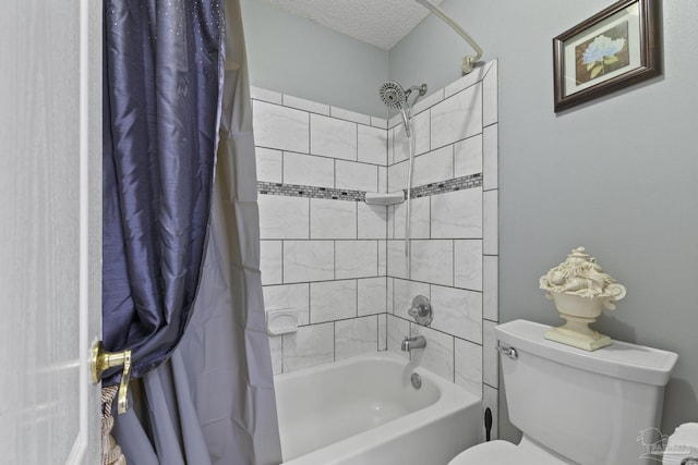 bathroom with shower / bathtub combination with curtain, a textured ceiling, and toilet