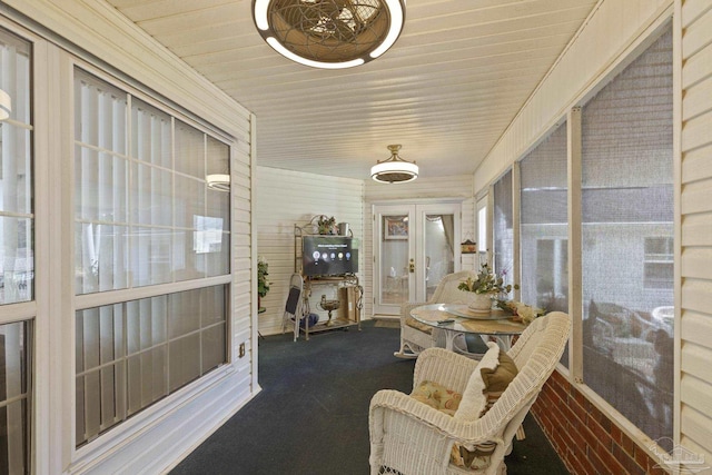 sunroom / solarium with wooden ceiling and french doors