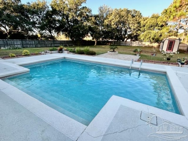 view of pool featuring a storage unit