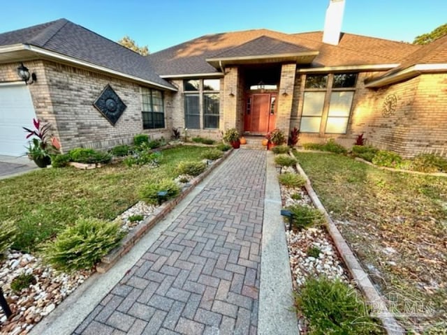 view of front of home featuring a garage