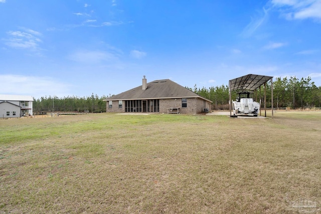 view of yard with a carport