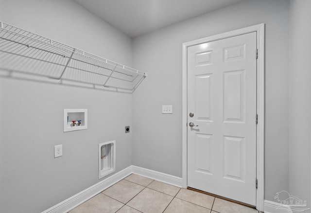 laundry room featuring light tile patterned flooring, washer hookup, and hookup for an electric dryer