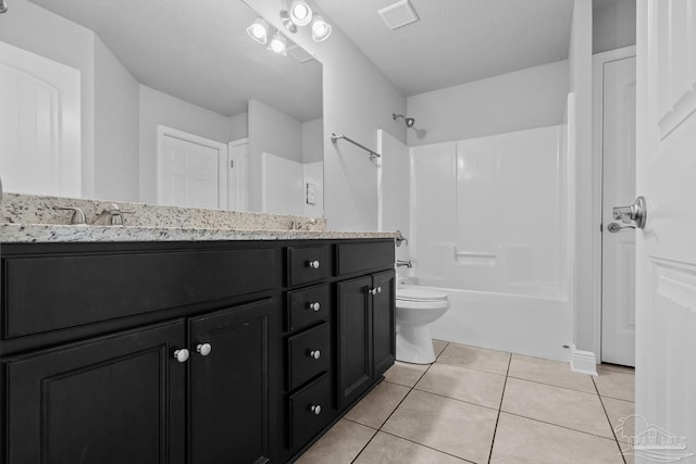 full bathroom featuring shower / tub combination, vanity, toilet, tile patterned floors, and a textured ceiling