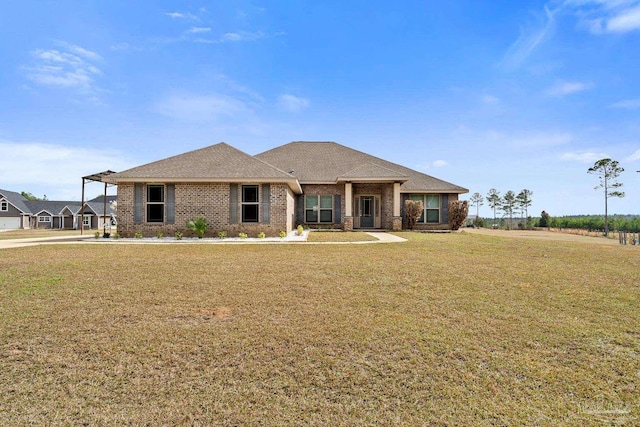 view of front of home featuring a front yard