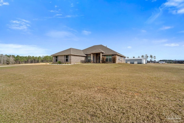 view of front of property with a front lawn