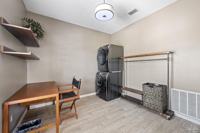 35868 Boykin Blvd, Lillian, AL 36549 - office space with light wood-style flooring, stacked washer / dryer, visible vents, and baseboards