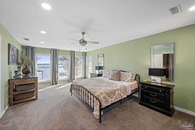 35868 Boykin Blvd, Lillian, AL 36549 - carpeted bedroom with a ceiling fan, a water view, visible vents, and baseboards
