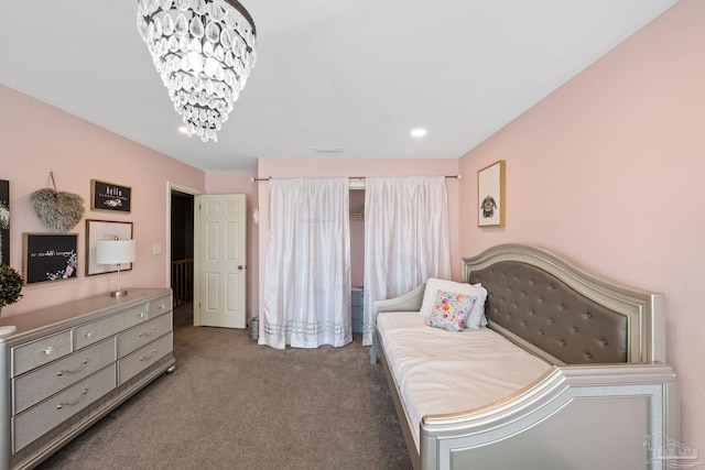 35868 Boykin Blvd, Lillian, AL 36549 - carpeted bedroom with an inviting chandelier