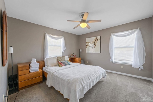 35868 Boykin Blvd, Lillian, AL 36549 - bedroom featuring light colored carpet, ceiling fan, and baseboards