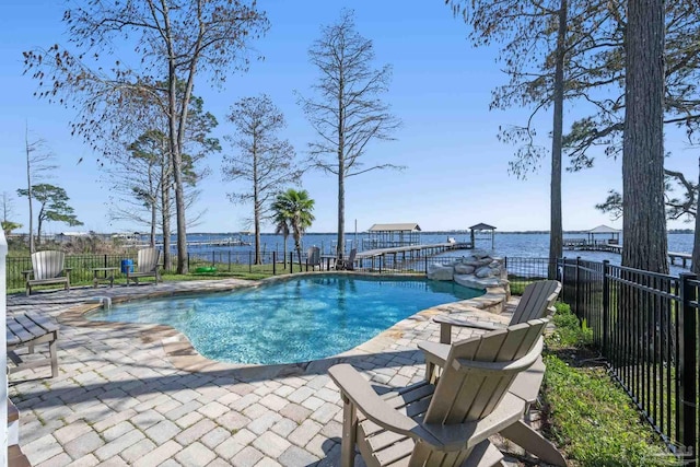 35868 Boykin Blvd, Lillian, AL 36549 - view of swimming pool featuring a fenced in pool, a water view, fence, and a patio