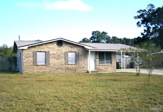 ranch-style home with a front yard