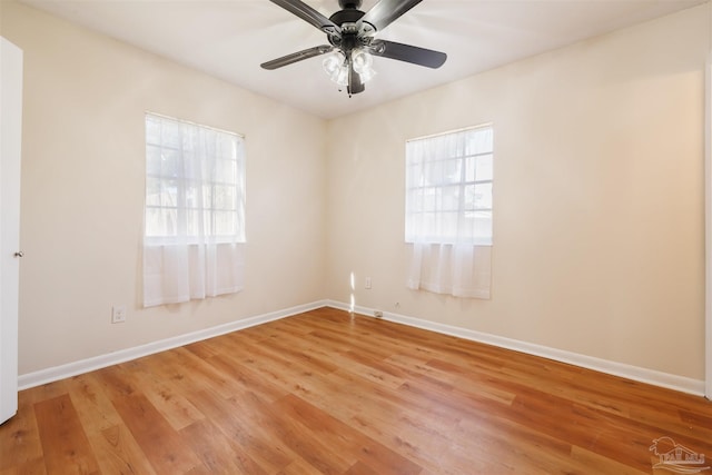 unfurnished room featuring ceiling fan and light hardwood / wood-style flooring