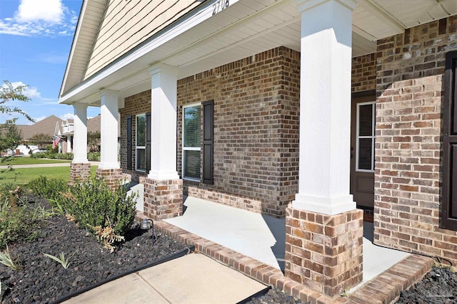 doorway to property featuring a porch