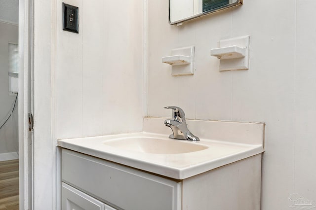 bathroom with wood-type flooring and vanity