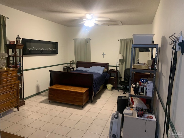 bedroom with light tile patterned floors and ceiling fan