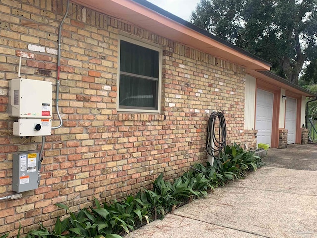 view of property exterior with a garage