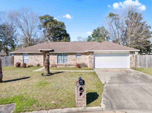 single story home with a front yard, concrete driveway, brick siding, and fence