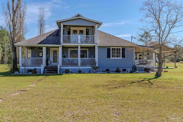 view of front of property featuring a balcony, covered porch, crawl space, and roof with shingles