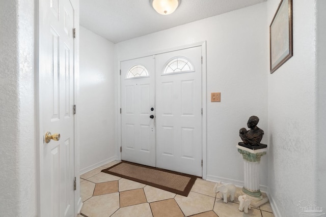 view of tiled foyer entrance