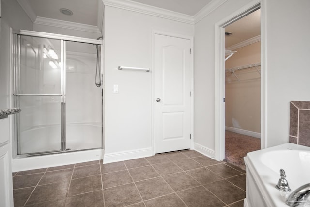 bathroom with ornamental molding, plus walk in shower, and tile patterned flooring