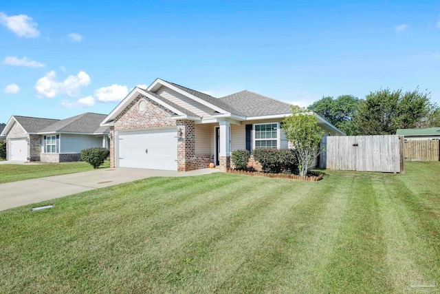 view of front facade featuring a front yard and a garage