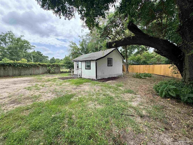 view of yard with a fenced backyard