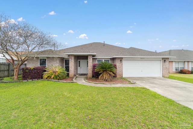 ranch-style house with a garage and a front yard