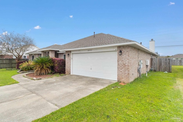 view of front facade featuring a garage and a front yard