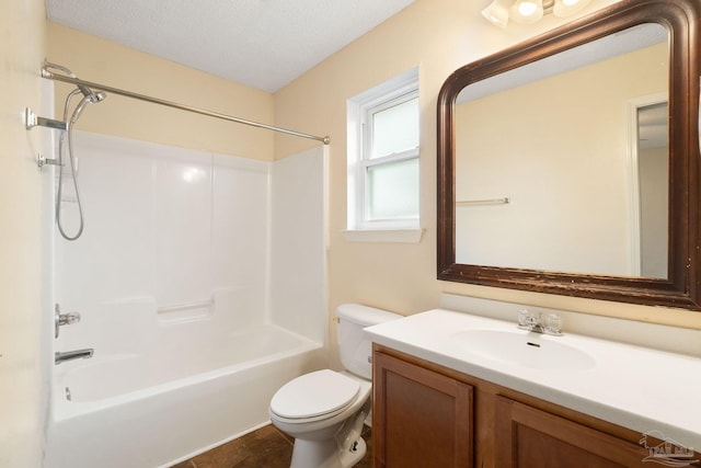 full bathroom featuring toilet, a textured ceiling, shower / bathtub combination, vanity, and tile patterned flooring