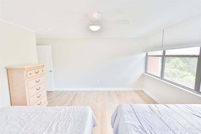 bedroom featuring ceiling fan and light hardwood / wood-style floors