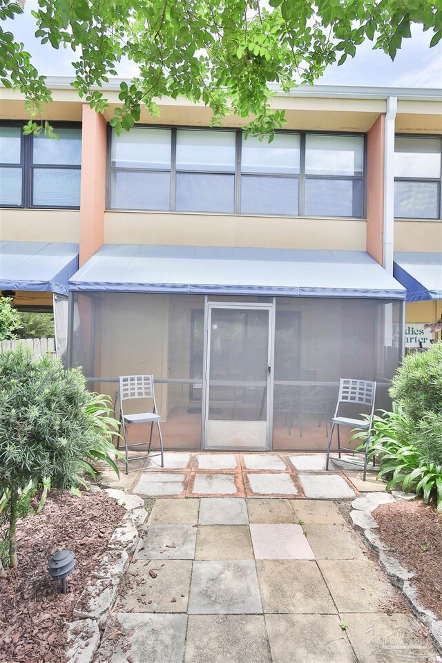 rear view of house featuring a patio area